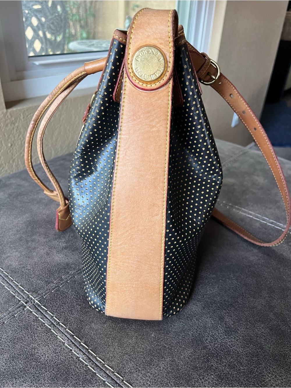 Dooney & Bourke-Vintage Black and Tan Drawstring Bucket Bag with Gold Studs - Picture 2 of 10